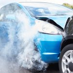 Close Up Of Two Cars Damaged In Road Traffic Accident